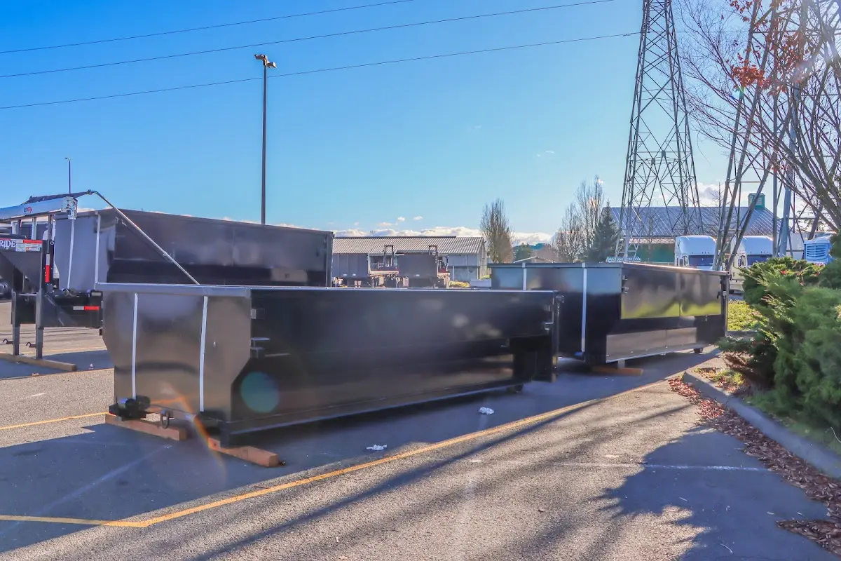 Roll-off dumpster ready for waste disposal at job site for Estate Cleanout Dumpster Rental in Rialto